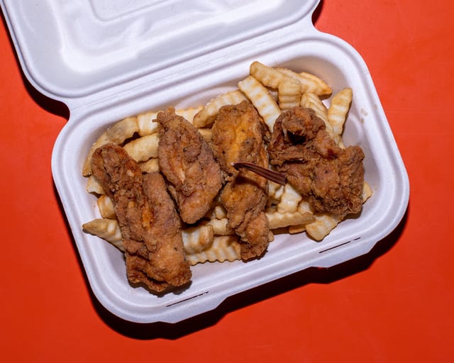 Kids Chicken Tenders w/ French Fries.